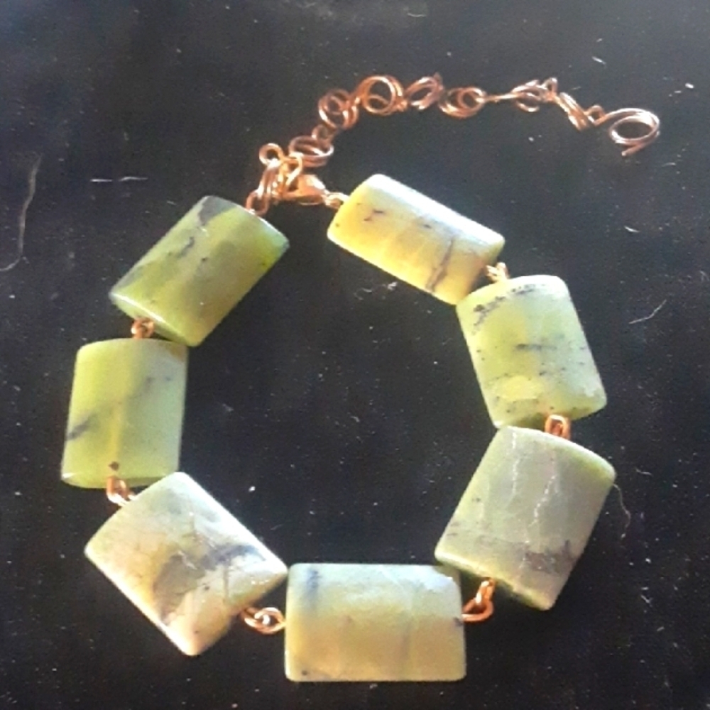 Handcrafted Green Stone Bracelet, and matching earrings.